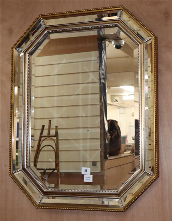 A reproduction octagonal marginal plate wall mirror, W.74cm H.94cm
